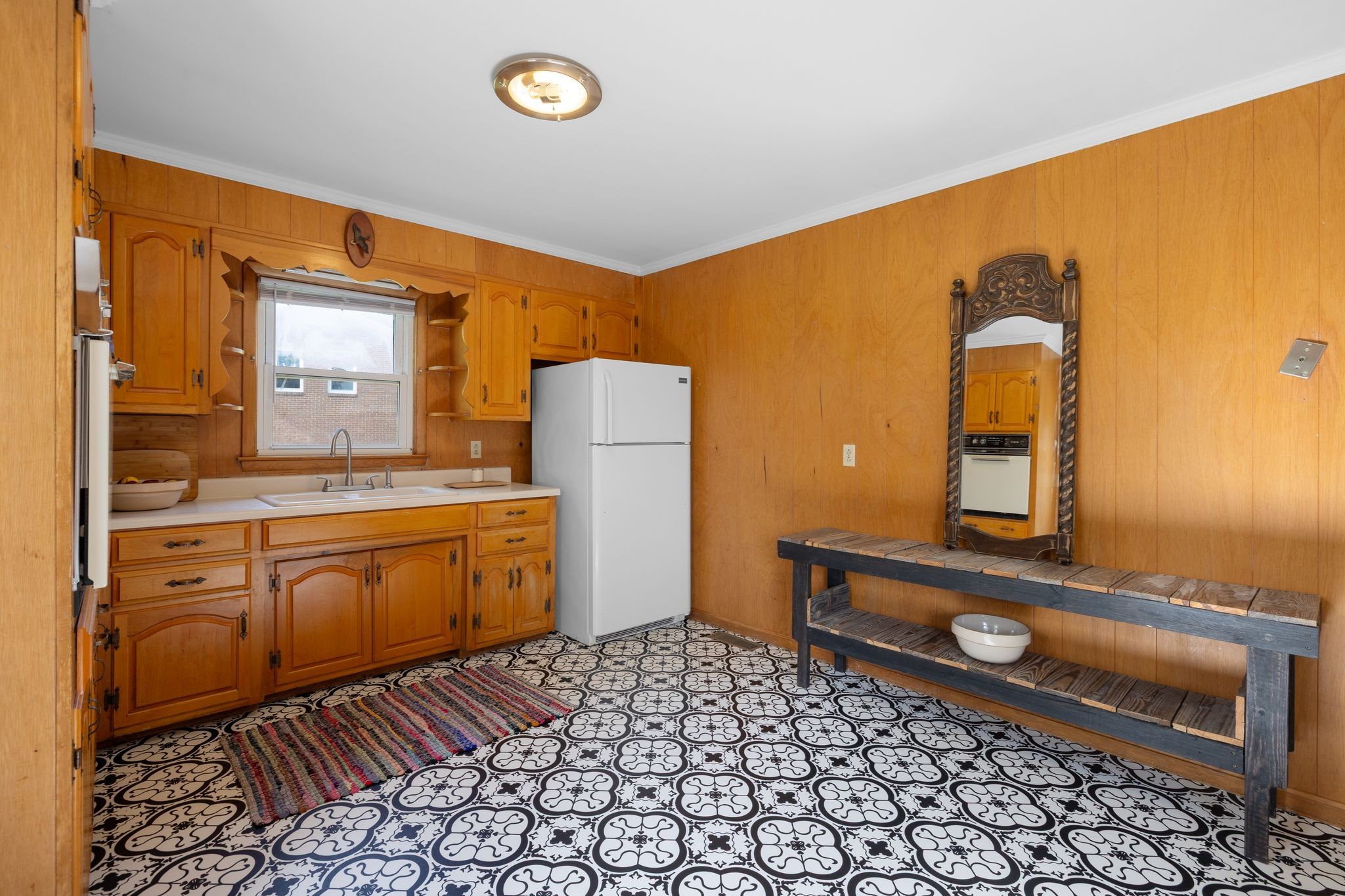 209 Apache Trail Columbia, TN 38401 - Photo 10 of 28 a bathroom with a sink a mirror and a shower