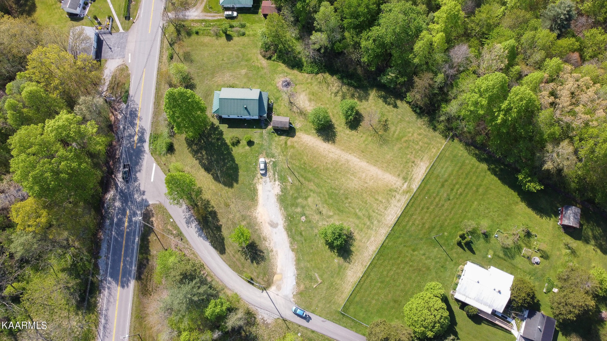 342 Raines Road Wartburg, TN 37887 - Photo 4 of 6 an aerial view of a house with outdoor space
