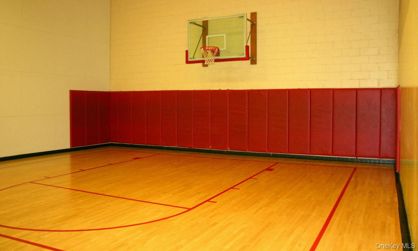 2 Bay Club Drive, Unit 6D Queens, NY 11360 - Photo 12 of 17 a view of a room with wooden floor and cabinet