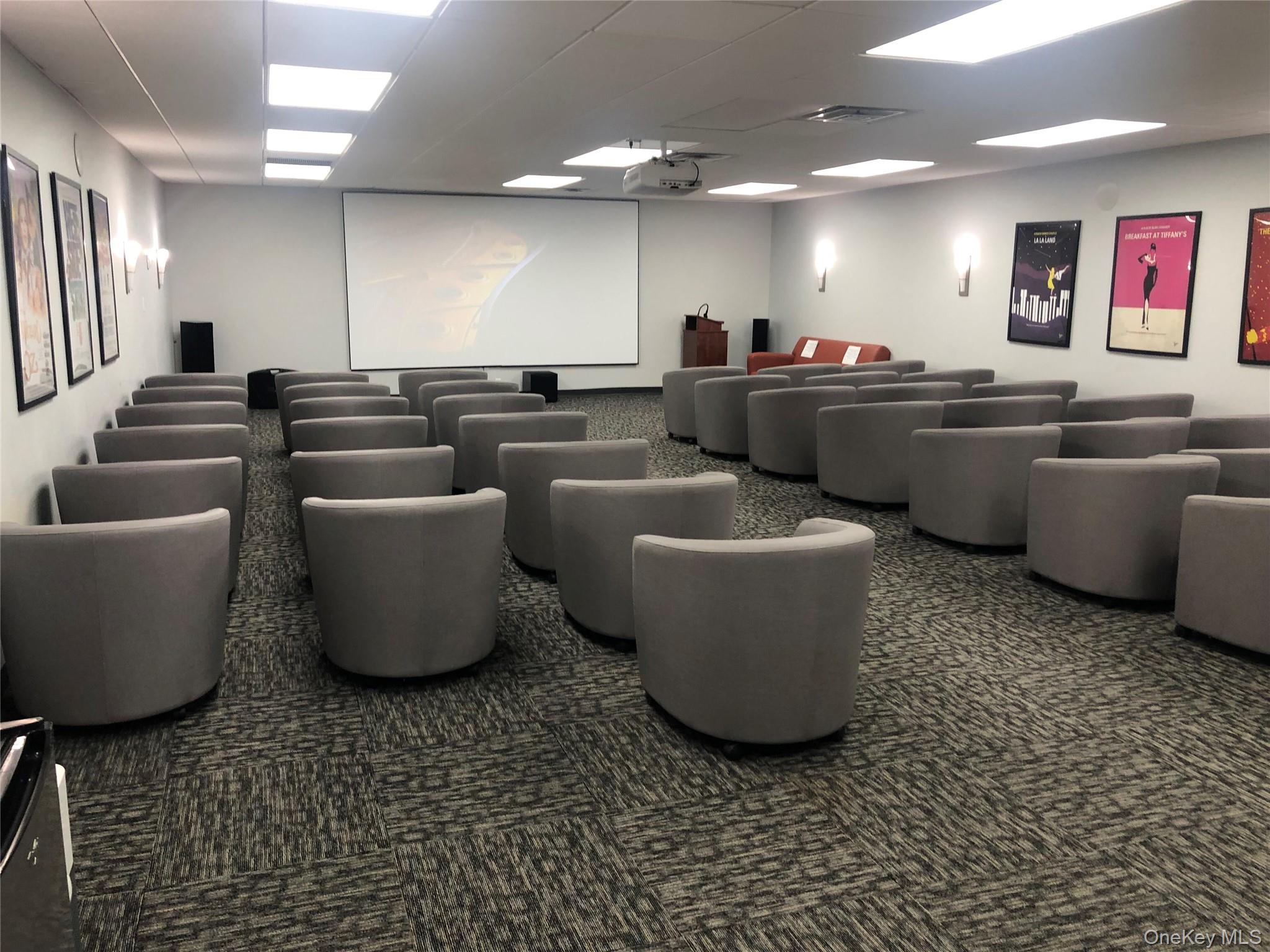 2 Bay Club Drive, Unit 6D Queens, NY 11360 - Photo 13 of 17 a room with lots of chairs and mirrors