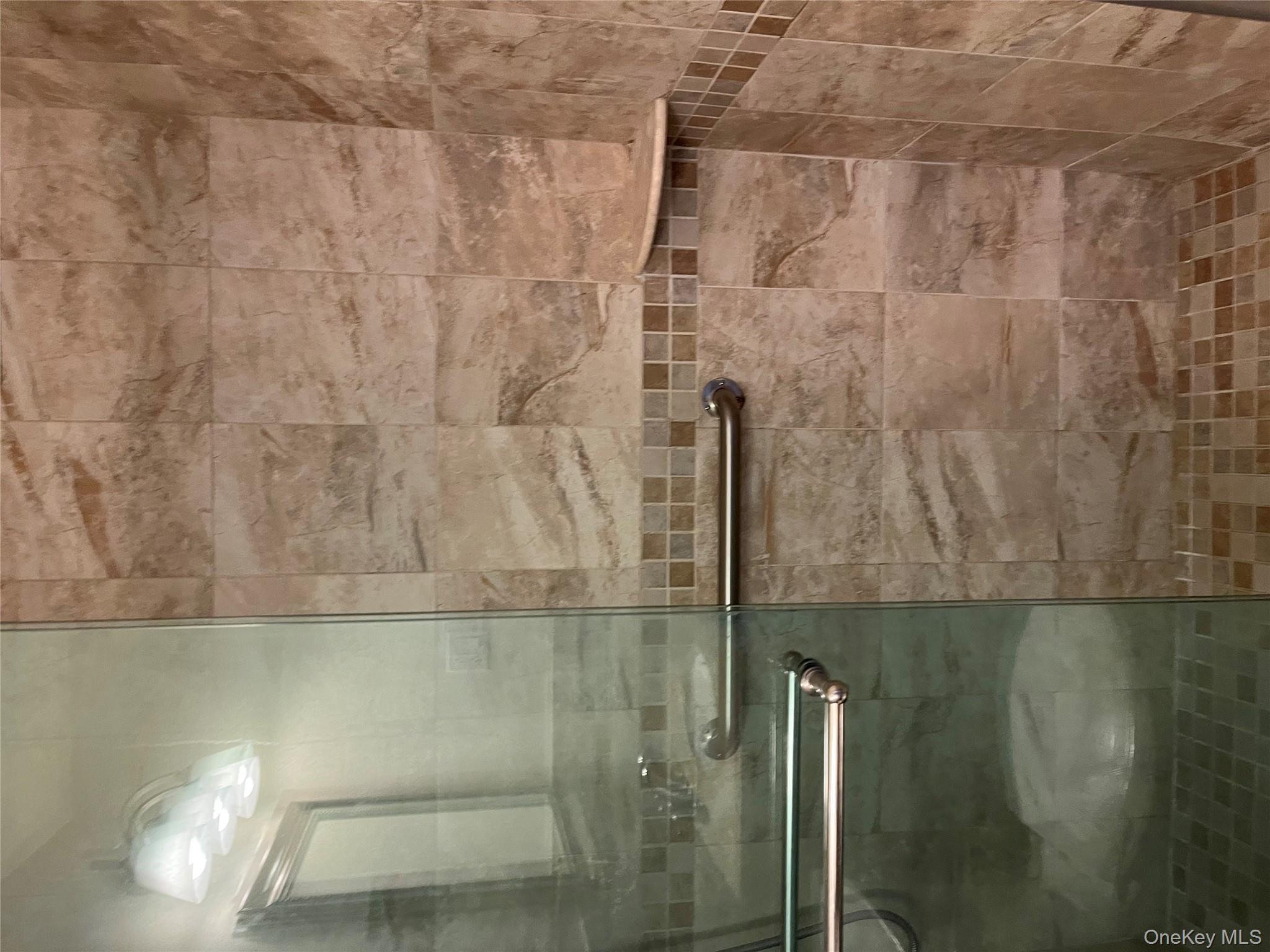 2 Bay Club Drive, Unit 6D Queens, NY 11360 - Photo 4 of 17 a bathroom with a shower