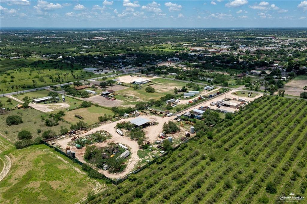 6470 North Moorefield Road Mission, TX 78573 - Photo 22 of 25 an aerial view of residential houses with outdoor space and lake view