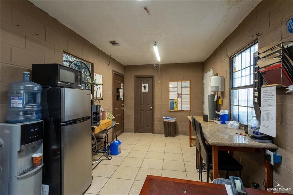6470 North Moorefield Road Mission, TX 78573 - Photo 10 of 25 a living room with furniture and a flat screen tv
