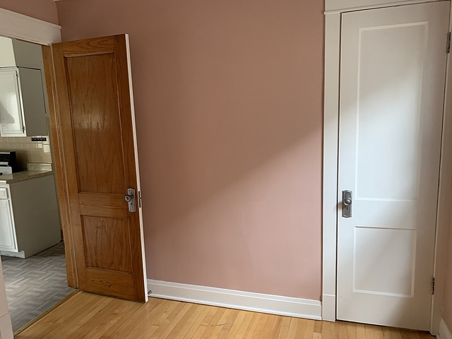 2309 Ridgeland Avenue Berwyn, IL 60402 - Photo 11 of 15 an empty room with wooden floor