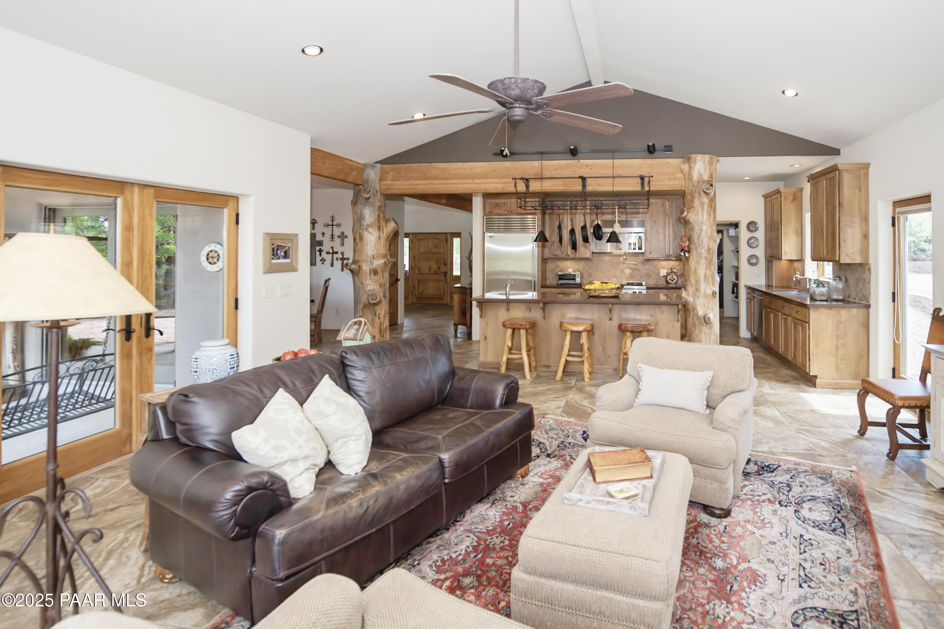 770 Grisby Road Skull Valley, AZ 86338 - Photo 15 of 58 a living room with furniture and a chandelier