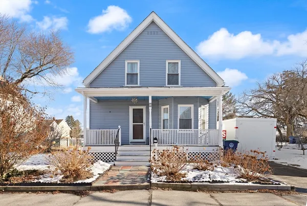 a front view of a house with garage