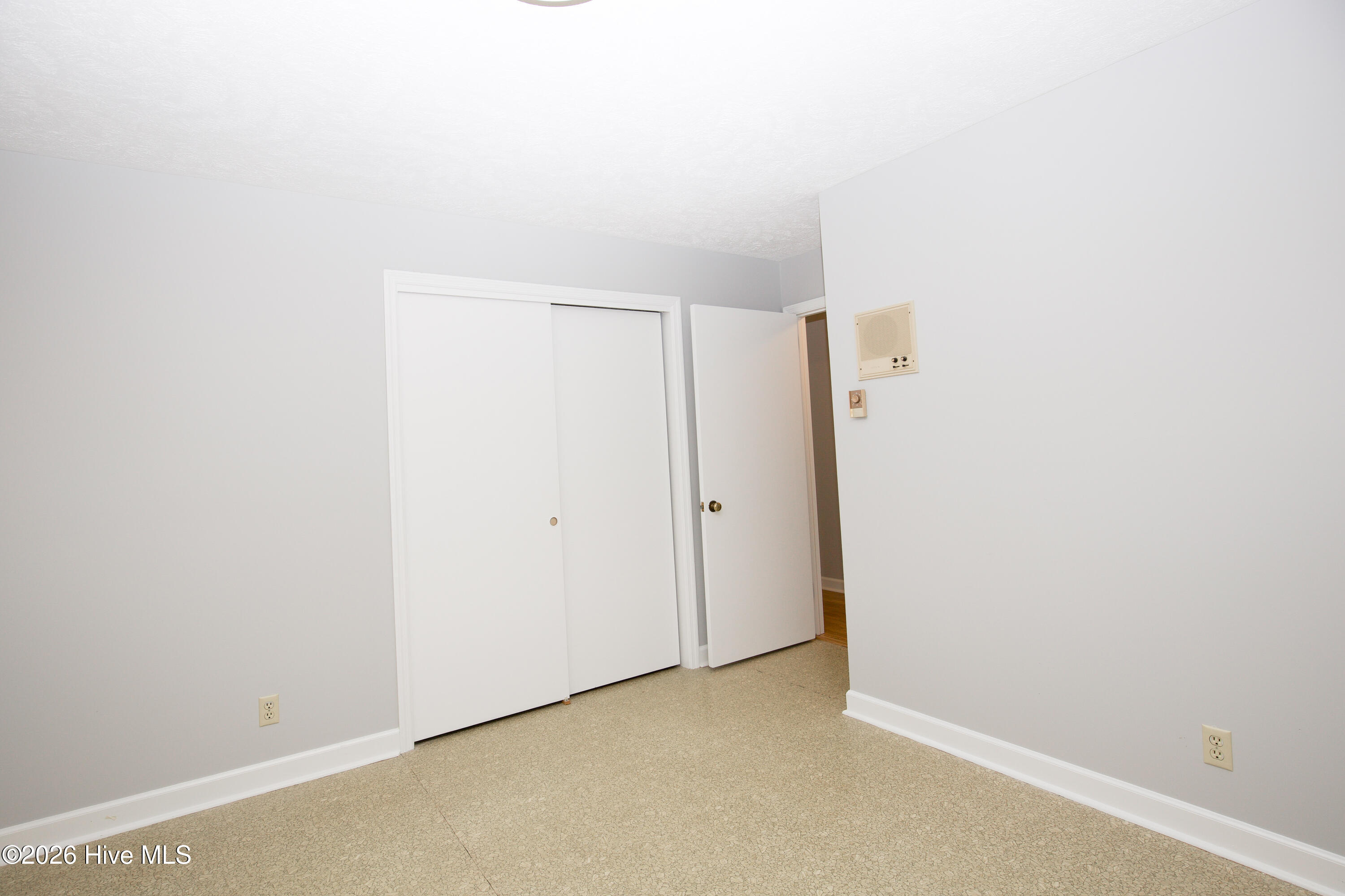 5068 Lobelia Road Vass, NC 28394 - Photo 45 of 70 This flexible room includes a closet and durable flooring—ideal for an office, gym, or playroom. It is not advertised as a bedroom per NCREC advertising guidelines, as this homes septic system is permitted for 3 bedrooms.