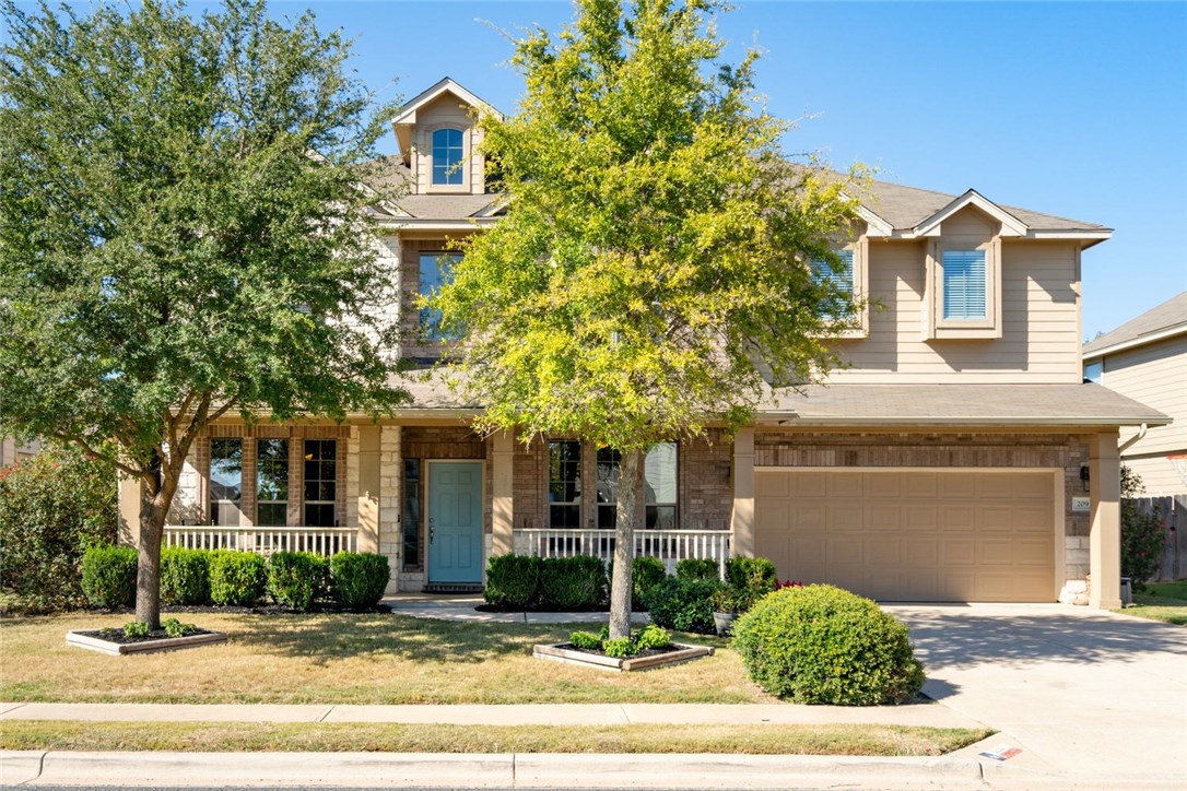 front view of a house with a small yard