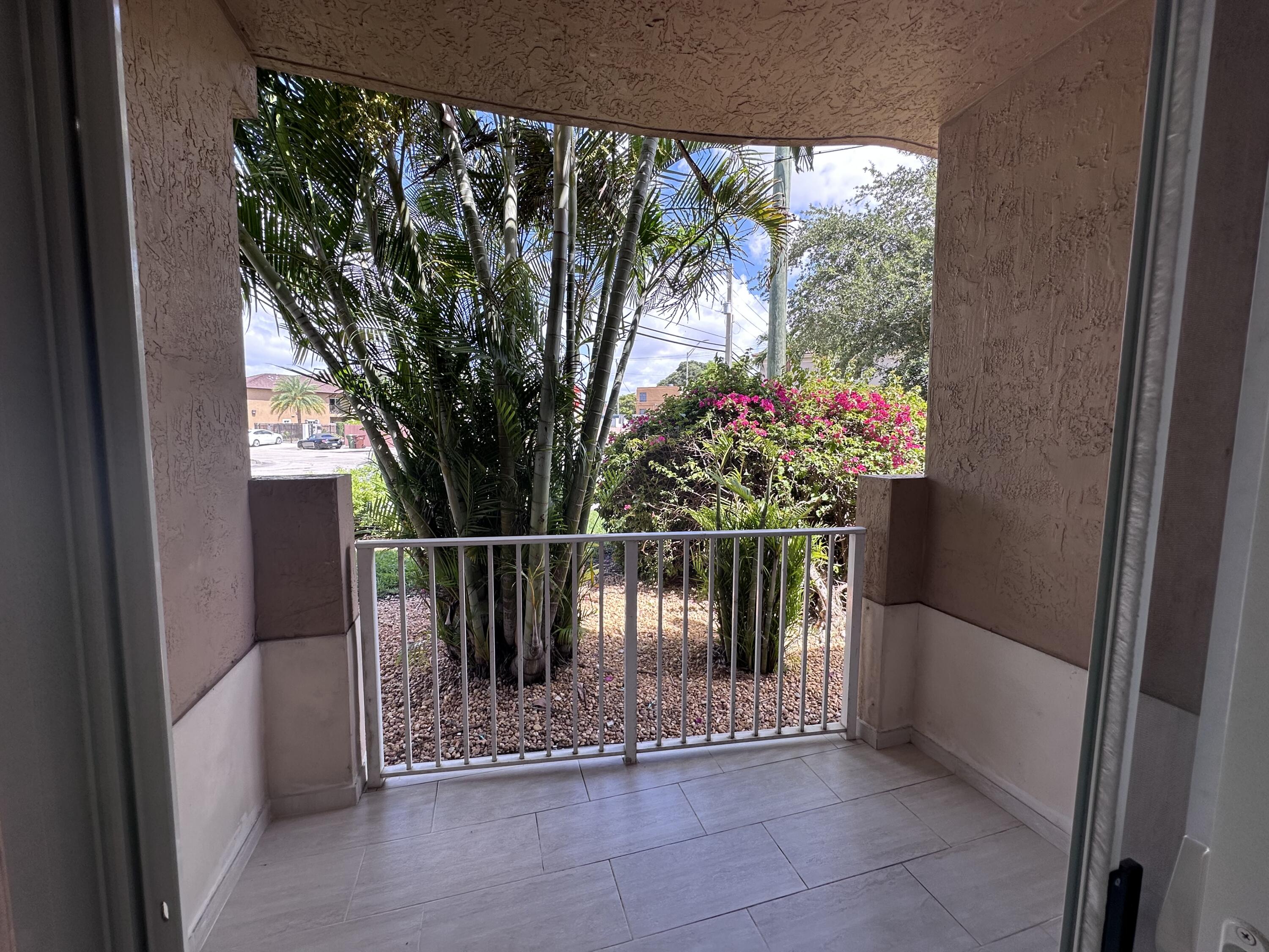300 East 4th Street, Unit 103 Hialeah, FL 33010 - Photo 3 of 27 Master porch