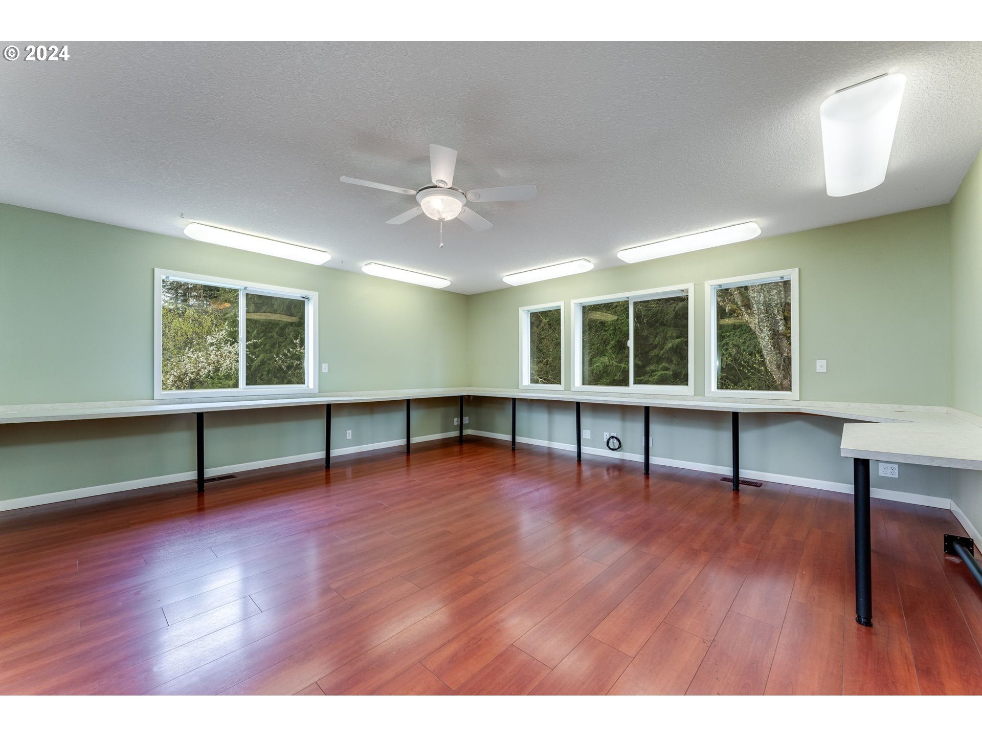 16583 Southwest Midway Road Hillsboro, OR 97123 - Photo 31 of 48 a view of an room with wooden floor and windows