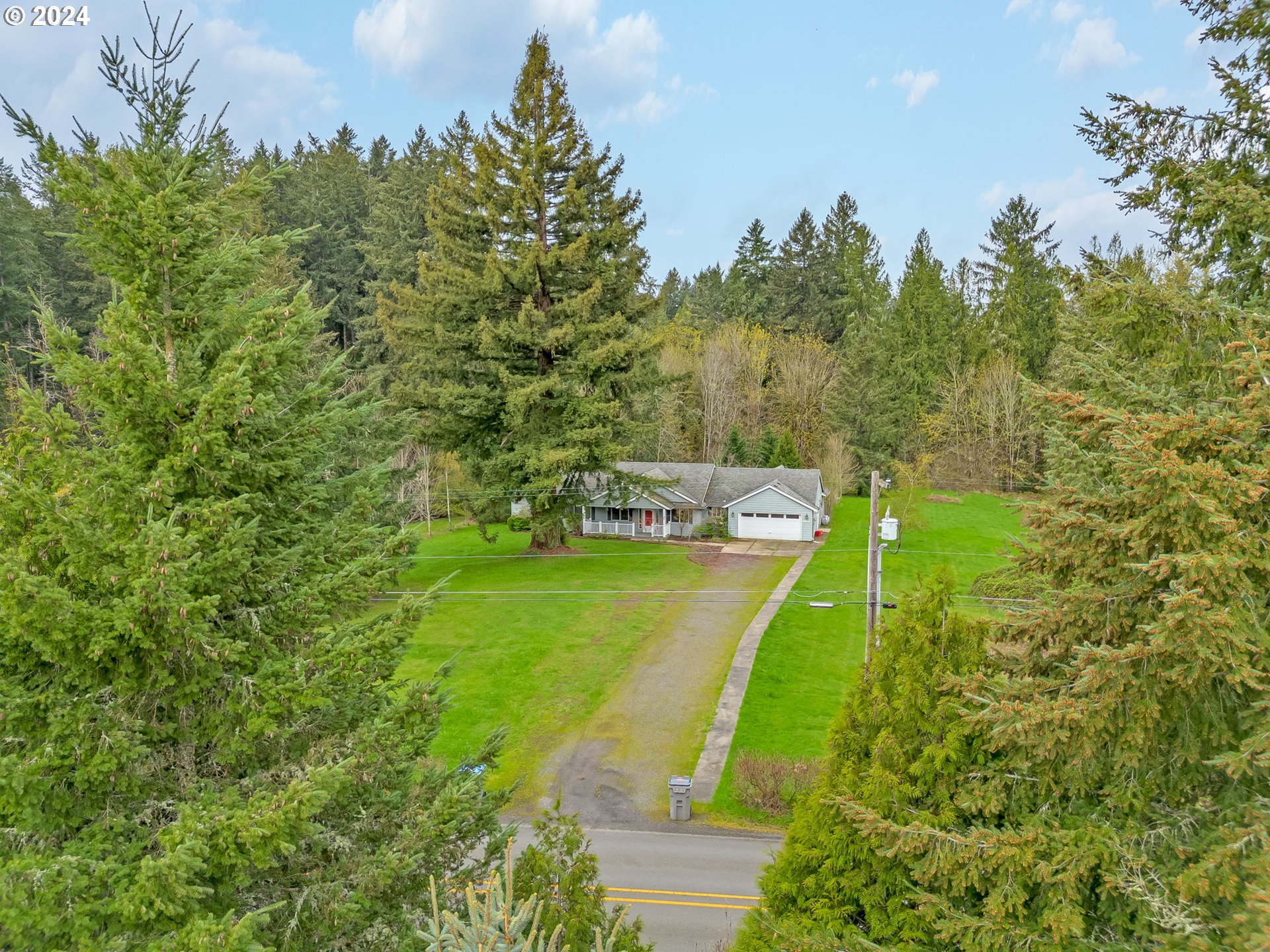 16583 Southwest Midway Road Hillsboro, OR 97123 - Photo 48 of 48 a view of a lake with a house