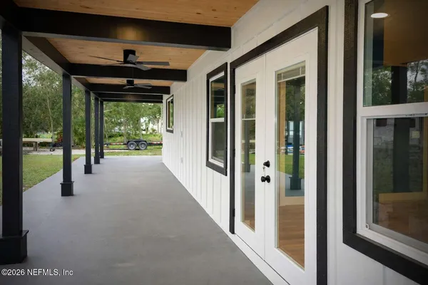 a view of a porch of a house