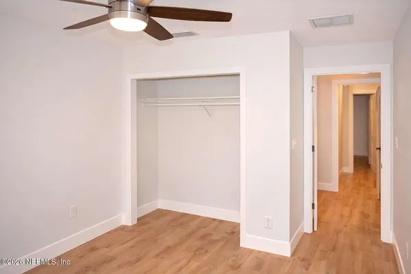 an empty room and wooden floor