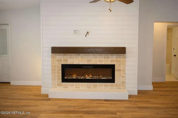 a living room with a fireplace