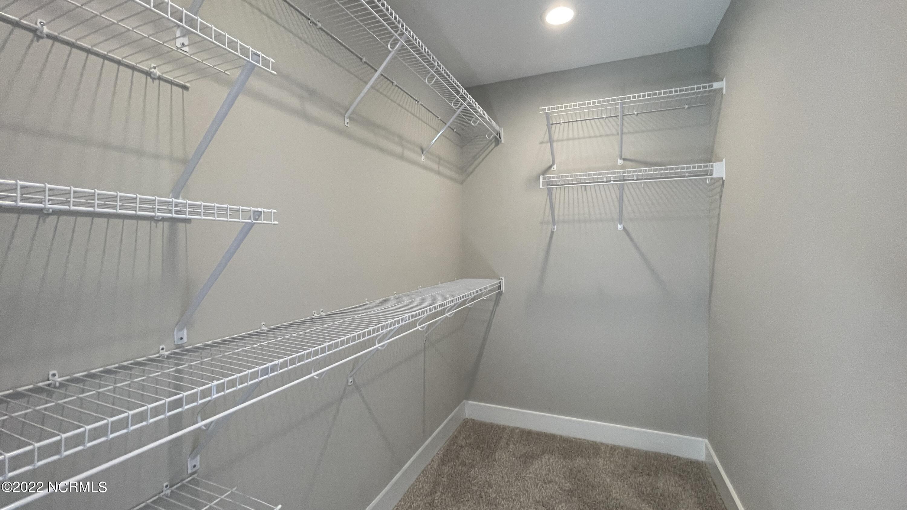286 Inverness Drive Hubert, NC 28539 - Photo 19 of 34 Owner Suite Closet