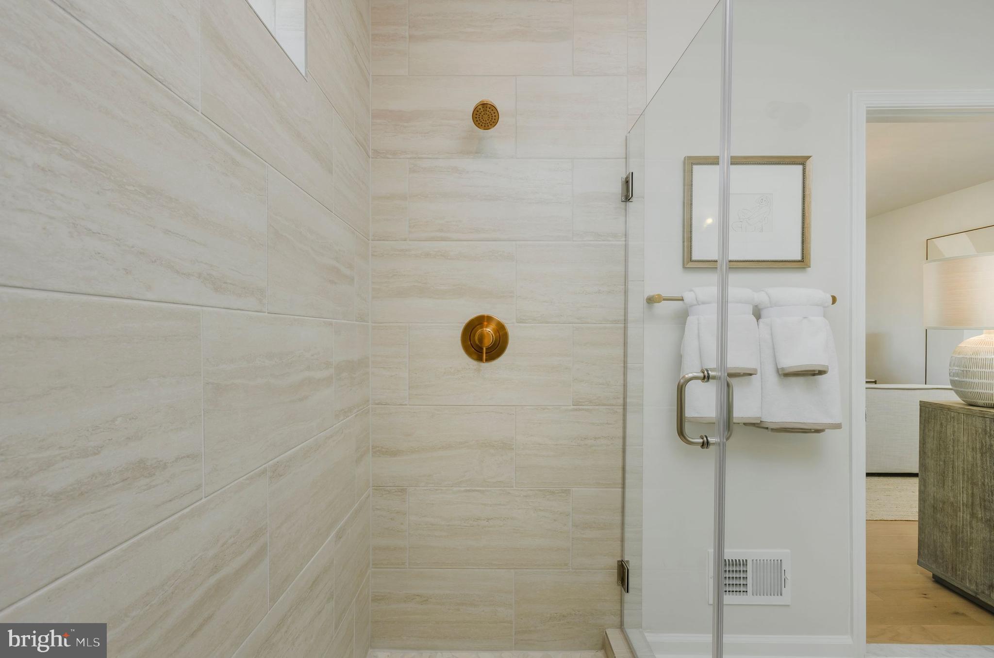 12109 Spirit Avenue Laurel, MD 20708 - Photo 21 of 33 a bathroom with a shower