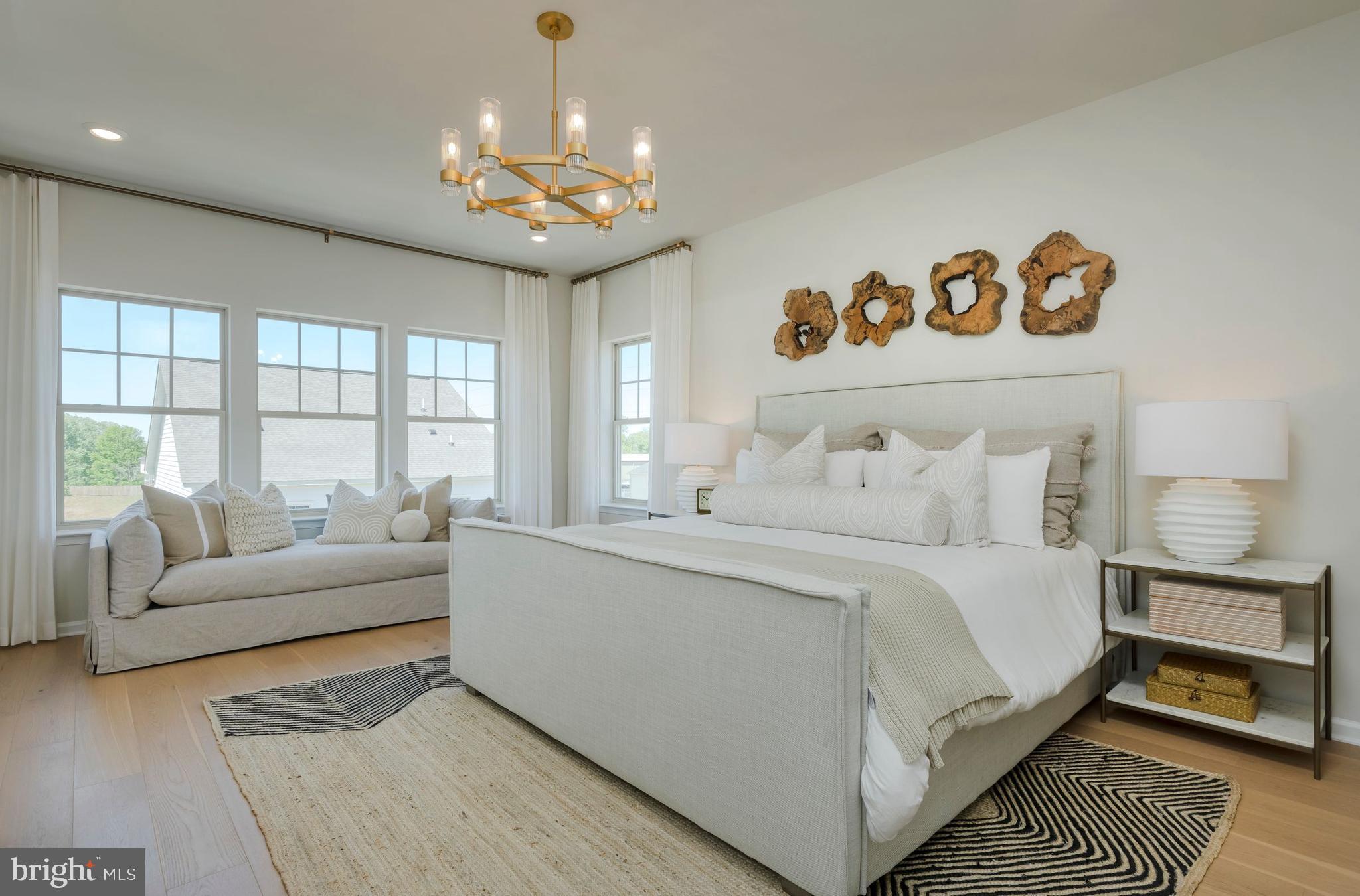 12109 Spirit Avenue Laurel, MD 20708 - Photo 23 of 33 a spacious bedroom with a bed and a large window