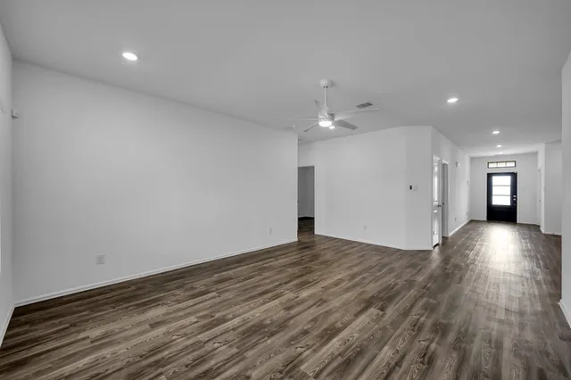 a view of an empty room and window