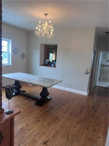 a room with furniture and a chandelier