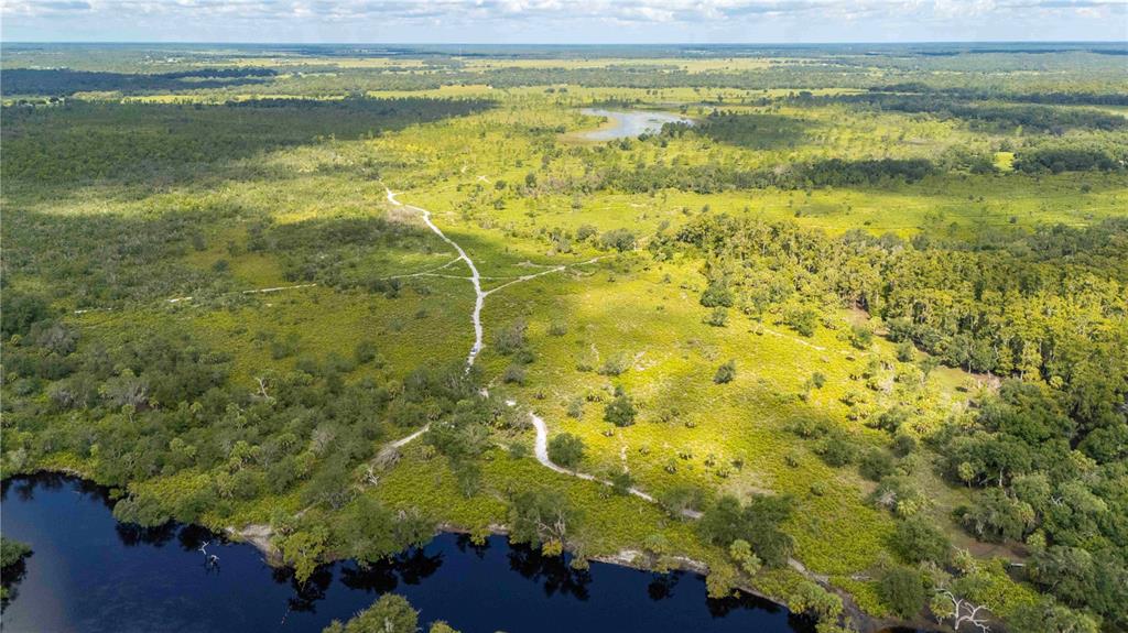 Southwest Addison Avenue, Unit A Arcadia, FL 34266 - Photo 2 of 13 a view of a yard with an outdoor space