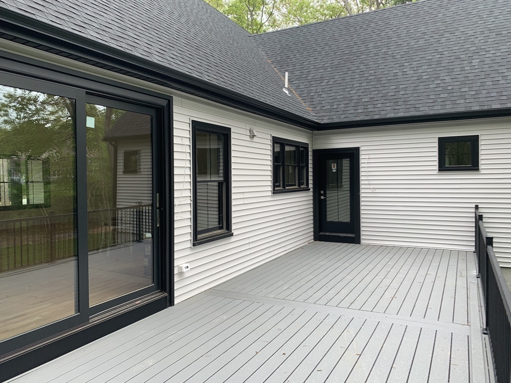 3 Baker Street Norton, MA 02766 - Photo 11 of 26 a view of a house with a balcony