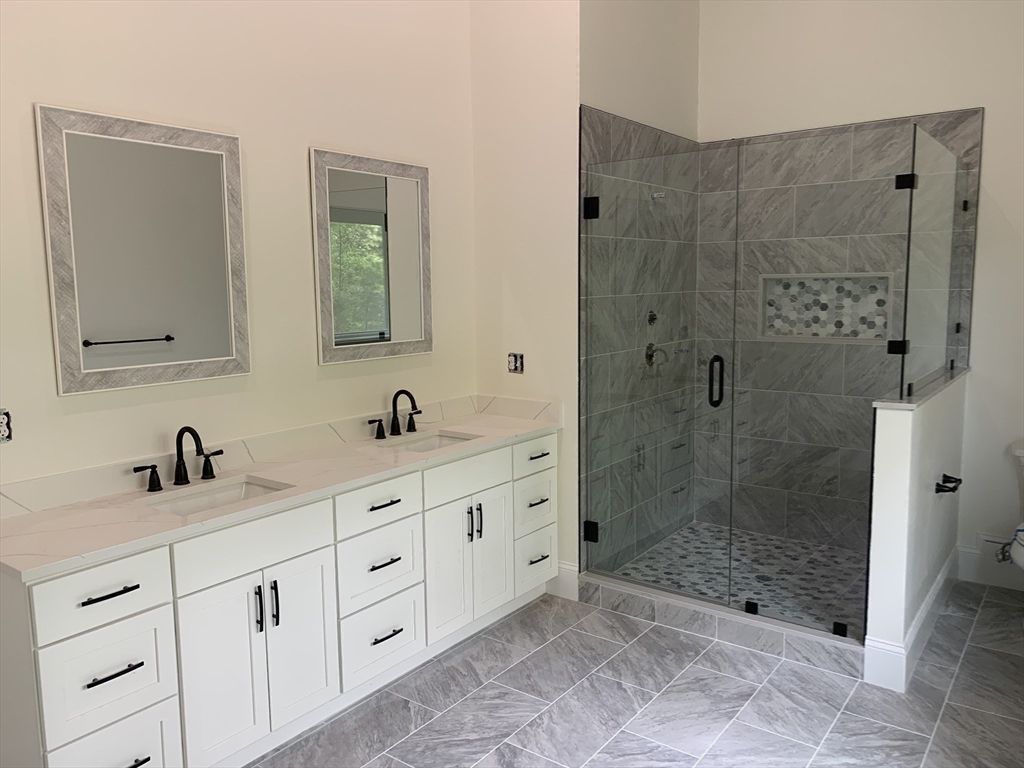 3 Baker Street Norton, MA 02766 - Photo 17 of 26 a bathroom with double sink and a shower