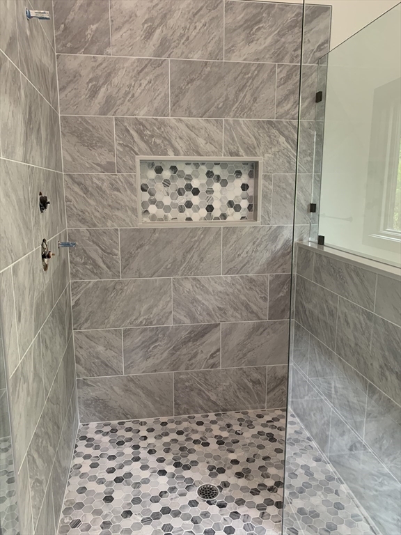 3 Baker Street Norton, MA 02766 - Photo 19 of 26 a bathroom with a shower