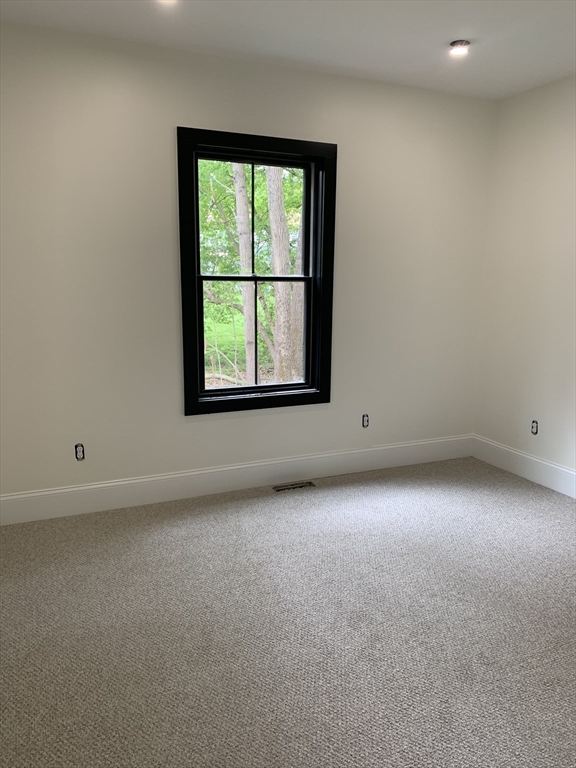 3 Baker Street Norton, MA 02766 - Photo 22 of 26 an empty room with a window