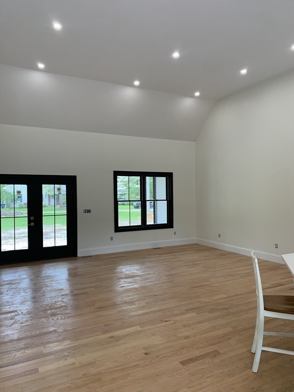 3 Baker Street Norton, MA 02766 - Photo 7 of 26 a view of an empty room with window and wooden floor