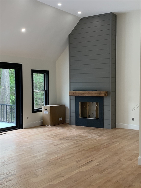 3 Baker Street Norton, MA 02766 - Photo 9 of 26 a view of an empty room with window and fire place