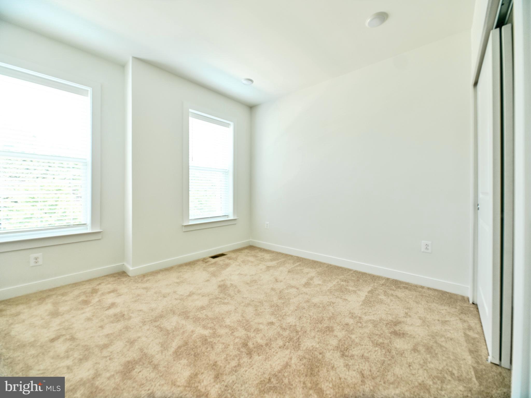 16076 Frederick Road Rockville, MD 20850 - Photo 20 of 30 a view of an empty room and window