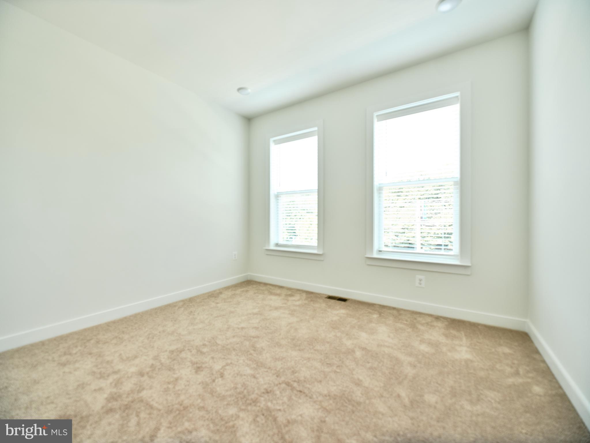 16076 Frederick Road Rockville, MD 20850 - Photo 21 of 30 an empty room with a window