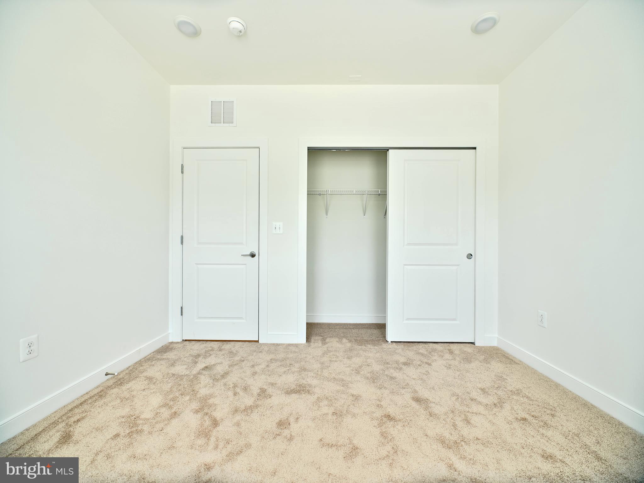 16076 Frederick Road Rockville, MD 20850 - Photo 22 of 30 an empty room with natural light