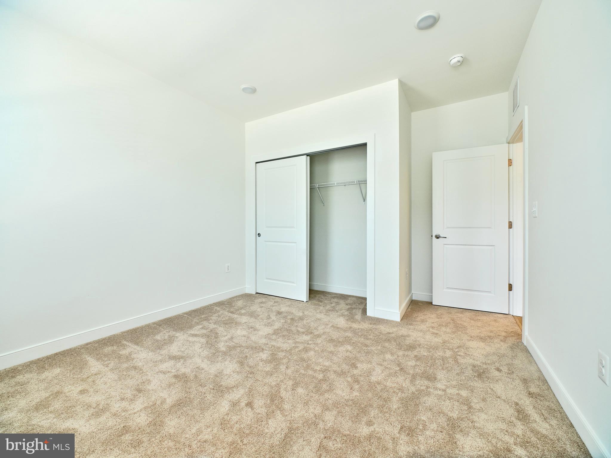 16076 Frederick Road Rockville, MD 20850 - Photo 24 of 30 an empty room with closet