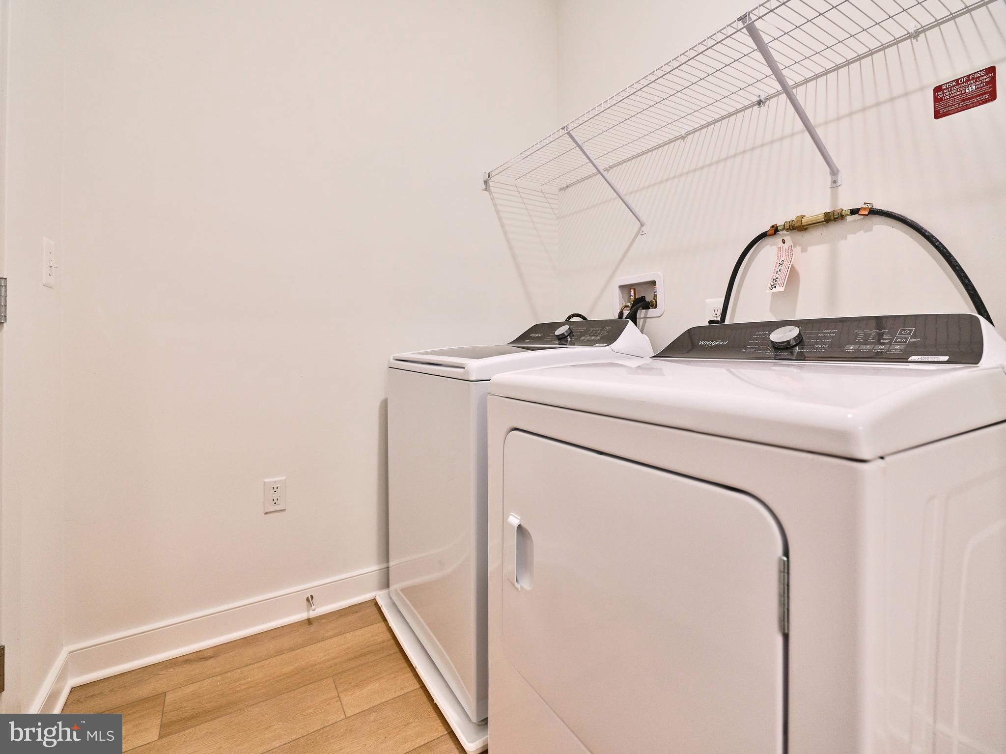 16076 Frederick Road Rockville, MD 20850 - Photo 28 of 30 a utility room with dryer and washer