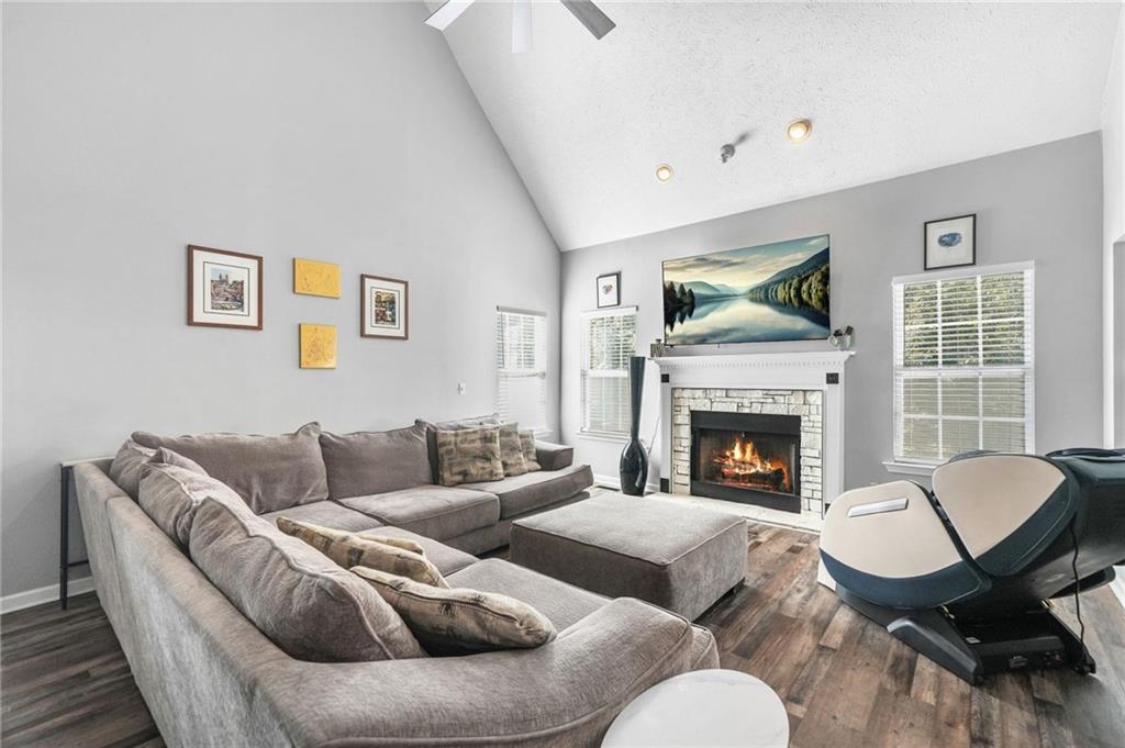 4835 Liberty Road Villa Rica, GA 30180 - Photo 11 of 69 a living room with furniture and a fireplace