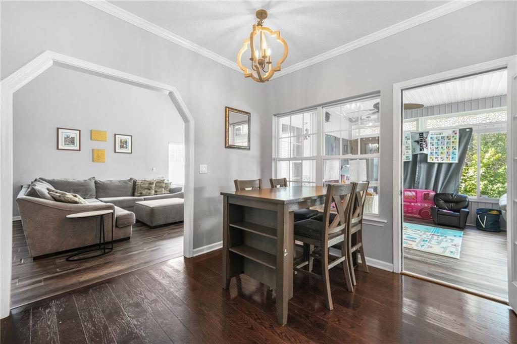 4835 Liberty Road Villa Rica, GA 30180 - Photo 17 of 69 a view of a dining room with furniture window and wooden floor