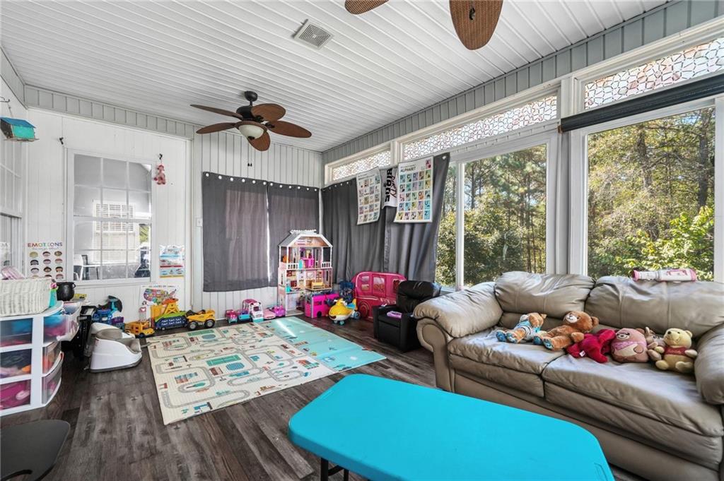 4835 Liberty Road Villa Rica, GA 30180 - Photo 19 of 69 a living room with furniture and a large window