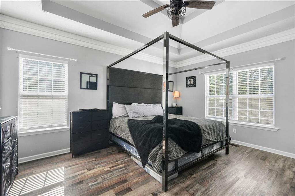 4835 Liberty Road Villa Rica, GA 30180 - Photo 20 of 69 a bedroom with a bed window and a ceiling fan