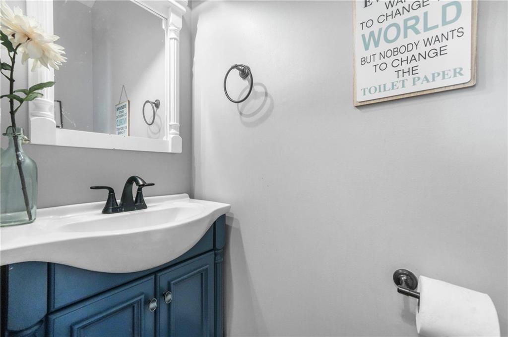 4835 Liberty Road Villa Rica, GA 30180 - Photo 30 of 69 a bathroom with a sink and a mirror
