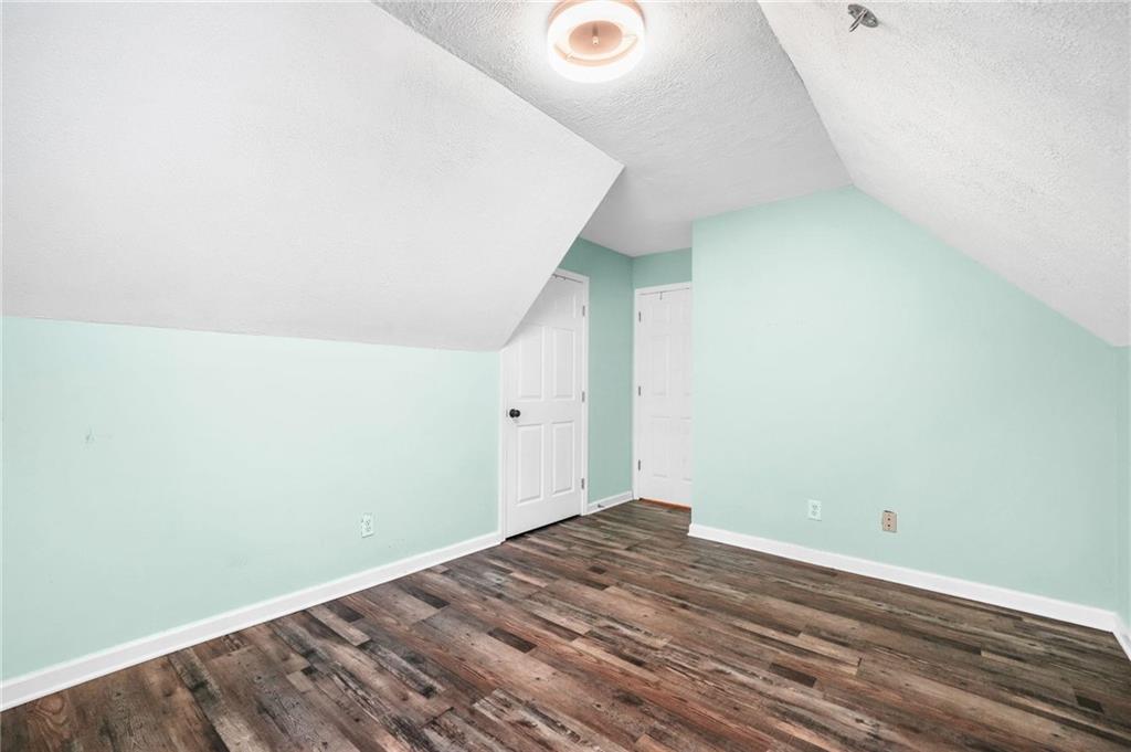 4835 Liberty Road Villa Rica, GA 30180 - Photo 35 of 69 a view of a room with wooden floor