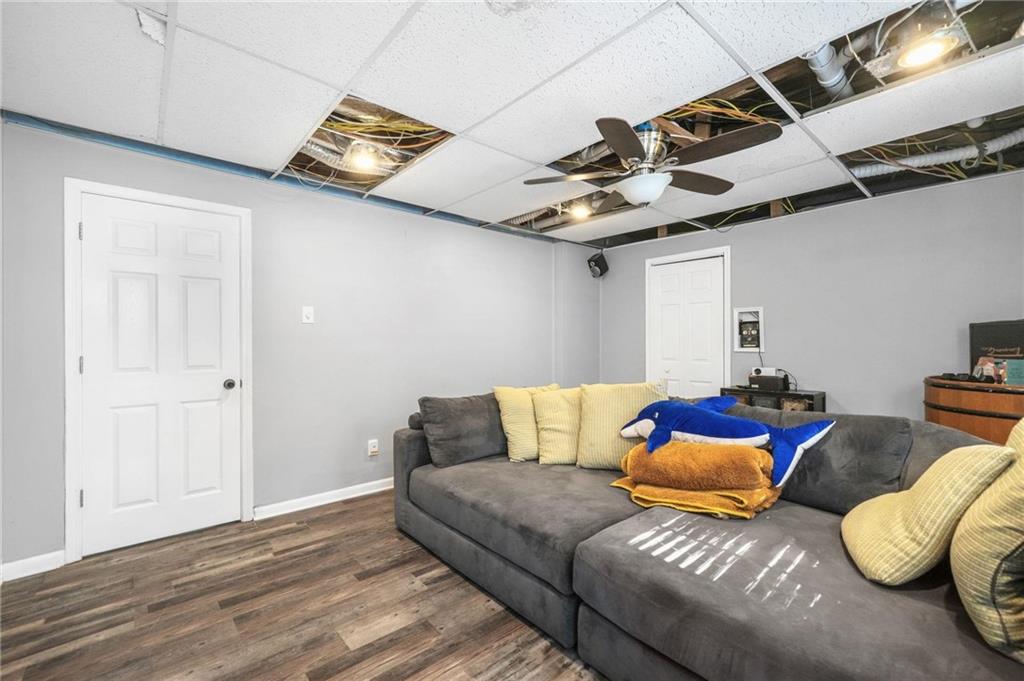 4835 Liberty Road Villa Rica, GA 30180 - Photo 40 of 69 a living room with furniture and wooden floor