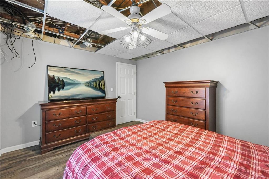 4835 Liberty Road Villa Rica, GA 30180 - Photo 42 of 69 a bedroom with a bed and a dresser