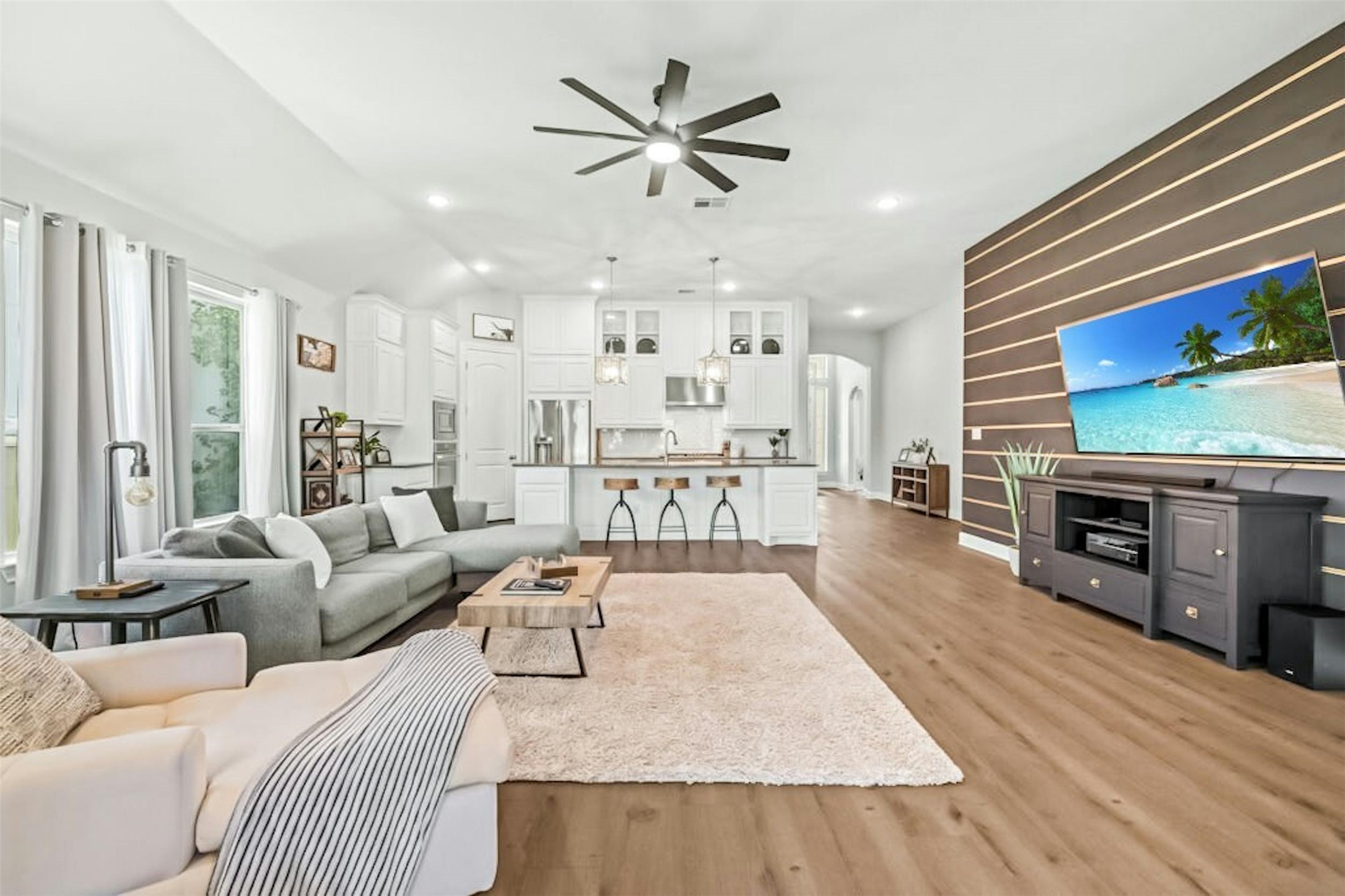 1820 Ficuzza Way Leander, TX 78641 - Photo 2 of 35 The open-concept design seamlessly connects the living
room to the kitchen.
