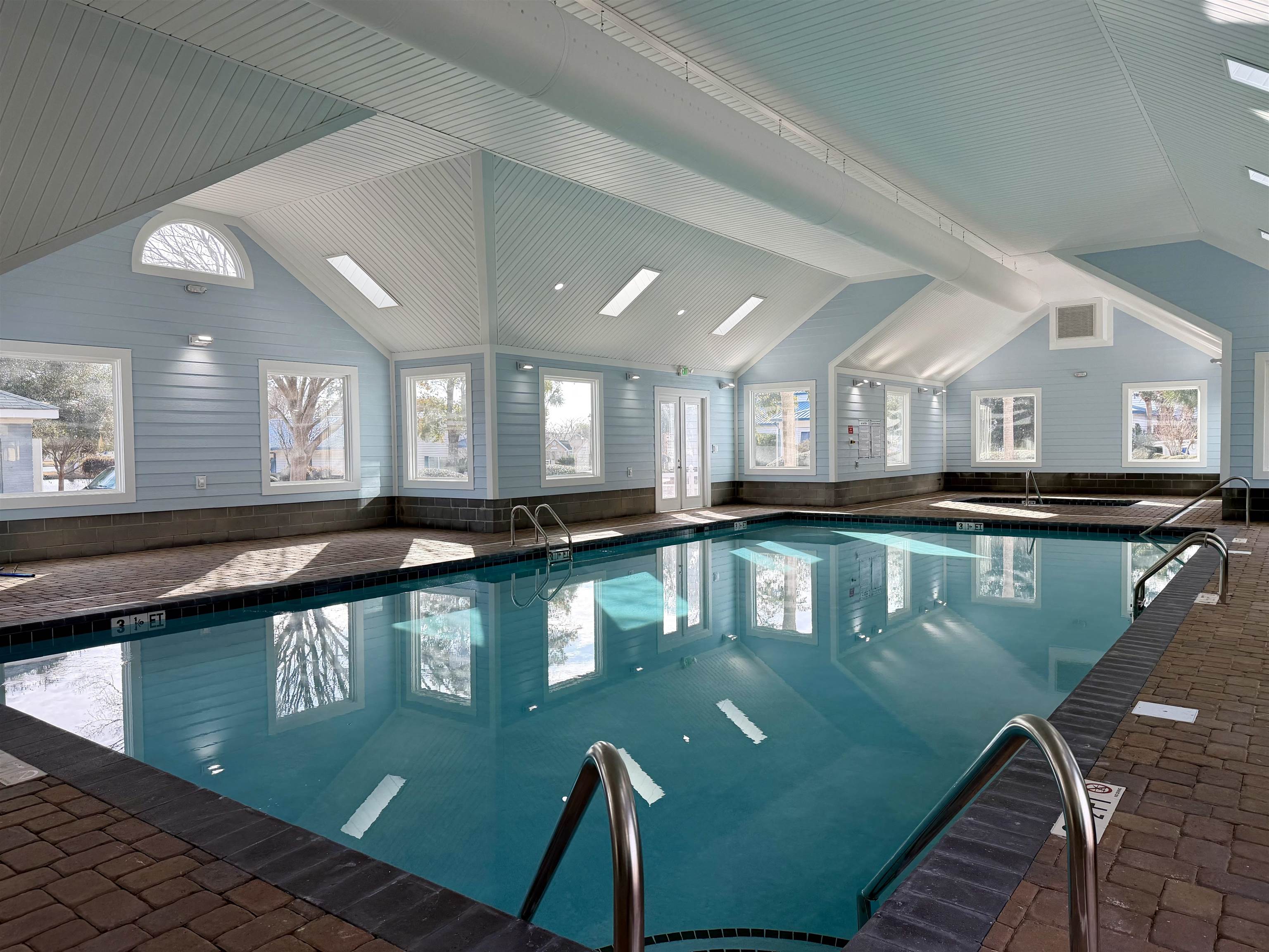 1980 Lark Surfside Beach, SC 29575 - Photo 23 of 30 Indoor community pool with a sink and a skylight