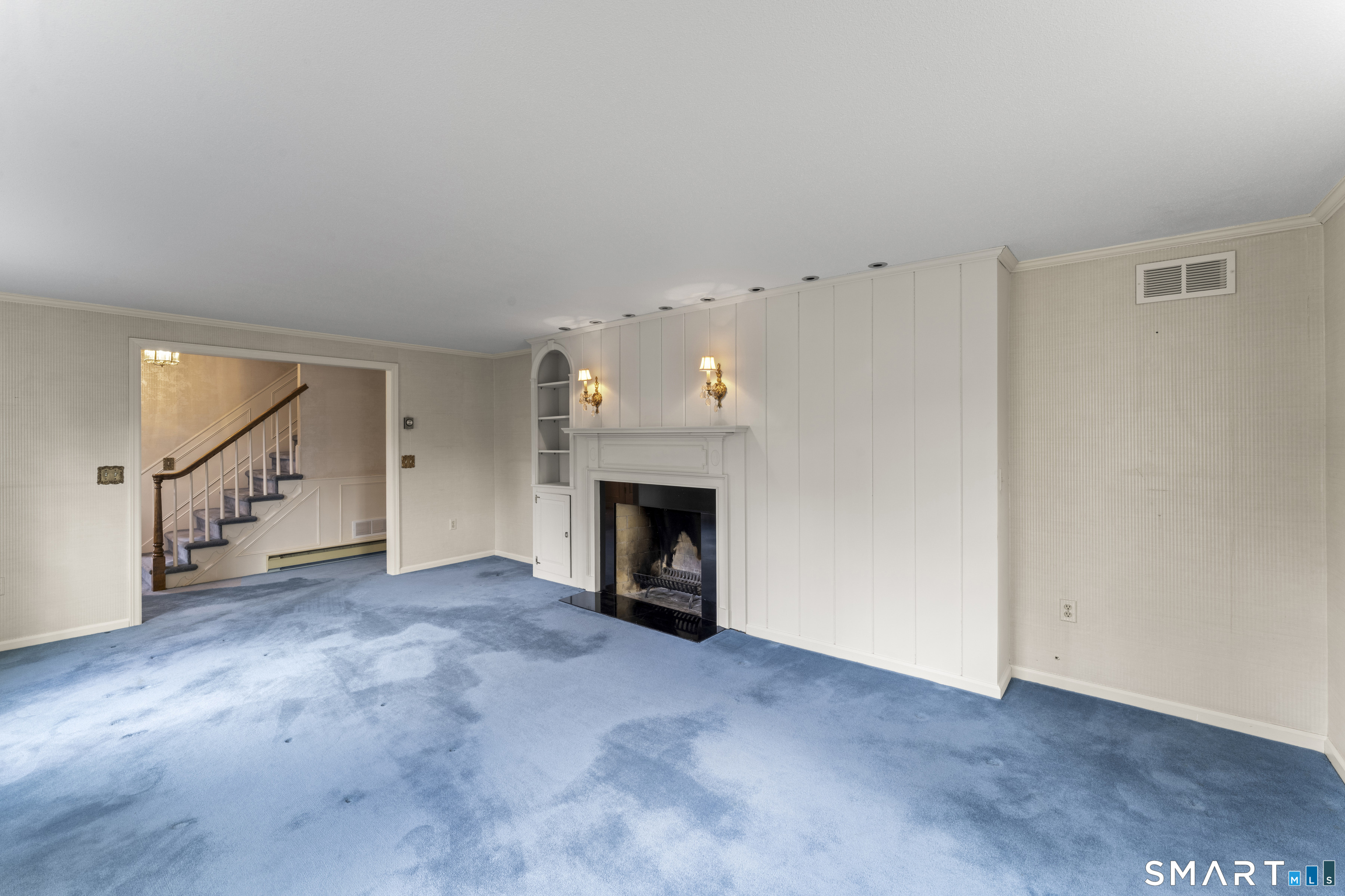 30 Currituck Road Newtown, CT 06470 - Photo 12 of 38 a view of an empty room with fireplace and a window