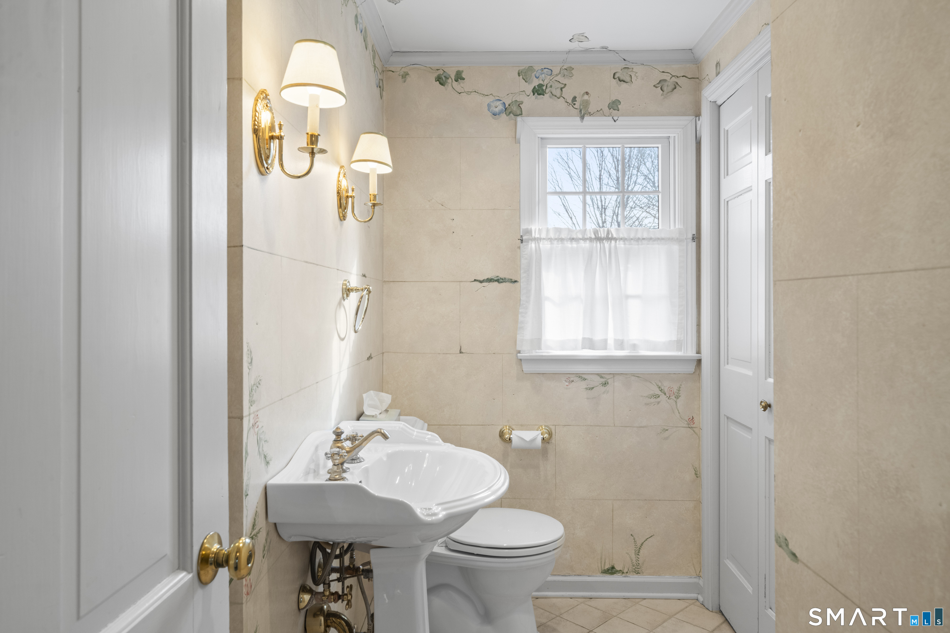 30 Currituck Road Newtown, CT 06470 - Photo 17 of 38 a bathroom with a sink toilet and mirror
