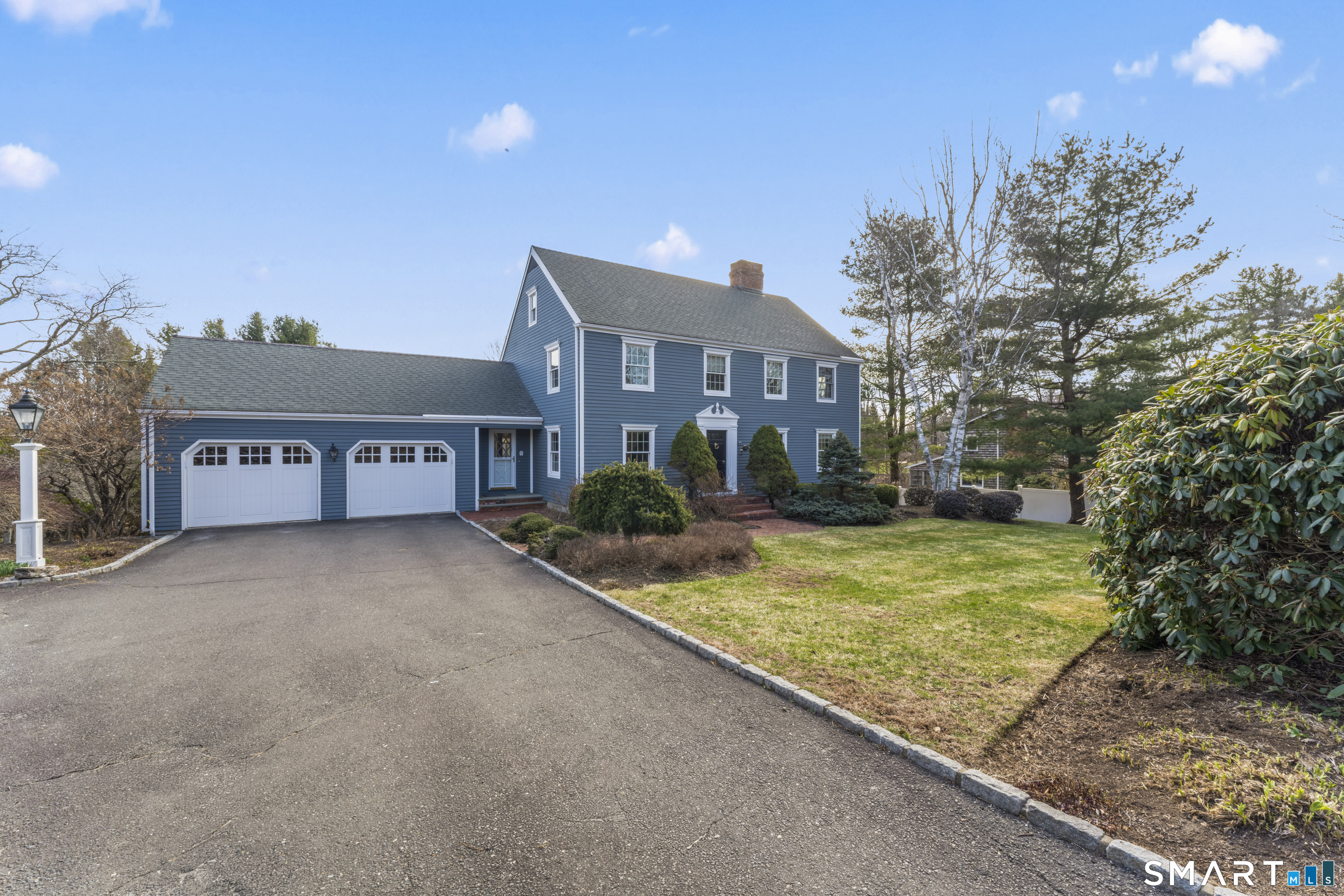 30 Currituck Road Newtown, CT 06470 - Photo 2 of 38 a view of a house with a backyard and a tree