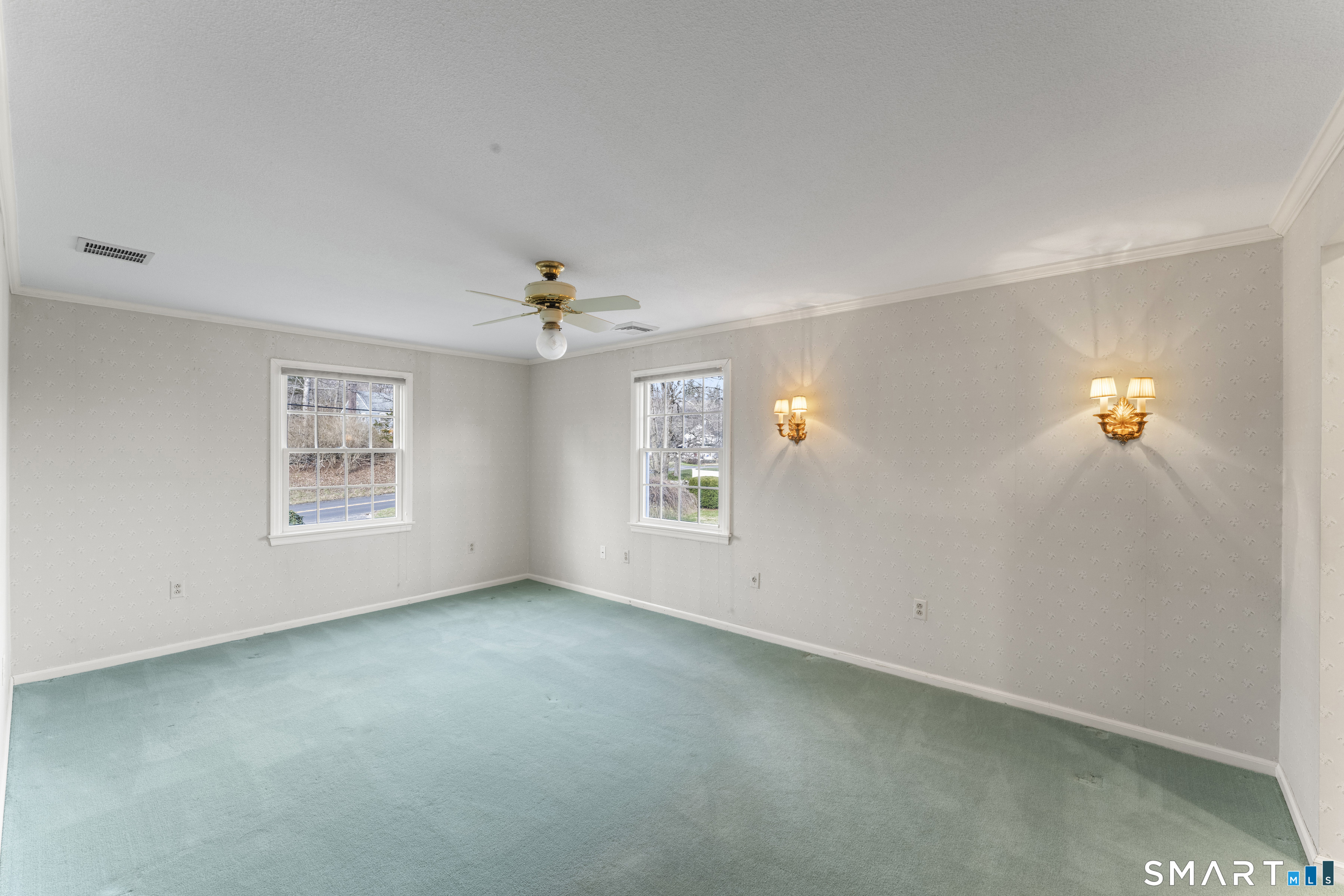 30 Currituck Road Newtown, CT 06470 - Photo 22 of 38 a view of an empty room with a window