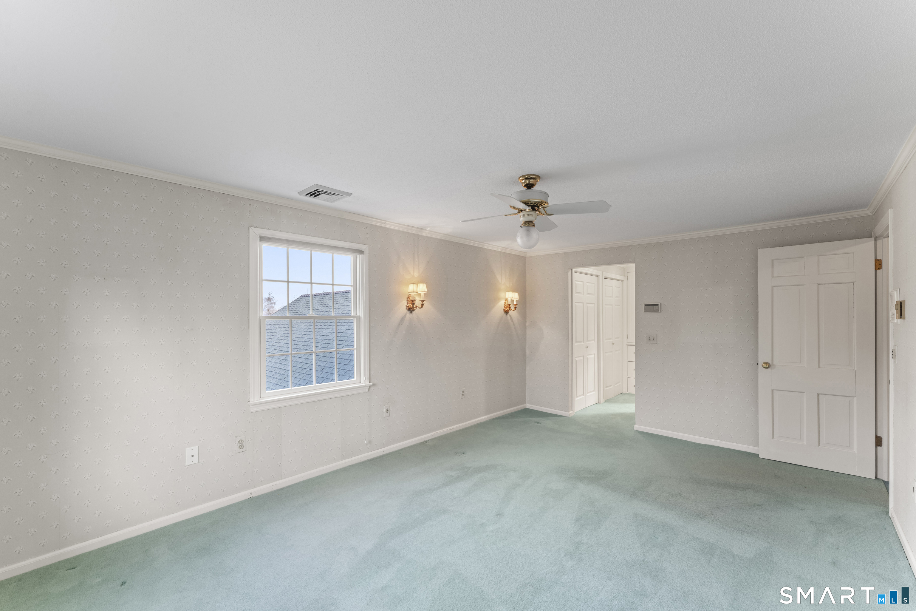 30 Currituck Road Newtown, CT 06470 - Photo 24 of 38 an empty room with windows and closet